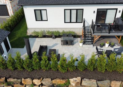 Terrassement et aménagement d'une cour arrière à Boischatel