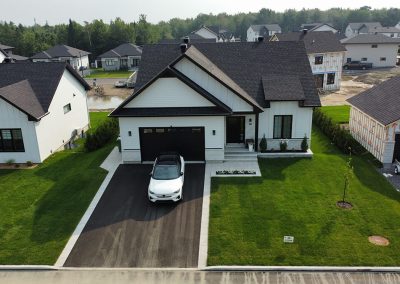 Terrassement et aménagement d'une cours avant à Boischatel